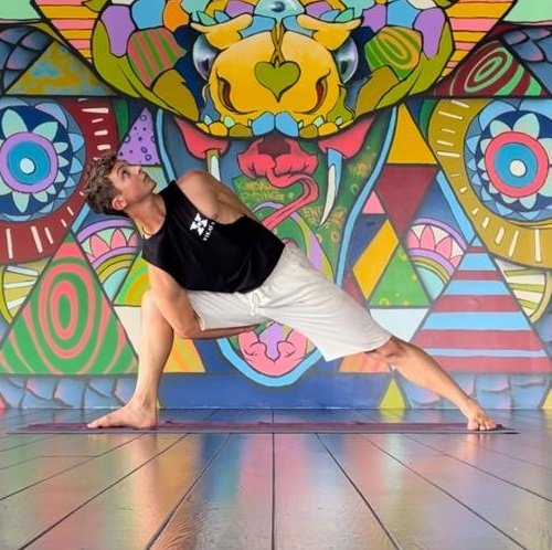Liam - Antaratma Yoga Shala Innsbruck Liam in bound Parshva Konasana at Vikasa Academy
